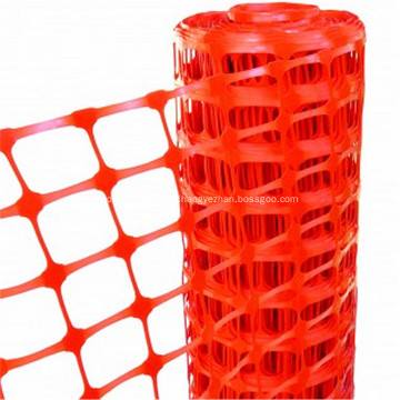 orange plastic road barrier safety net